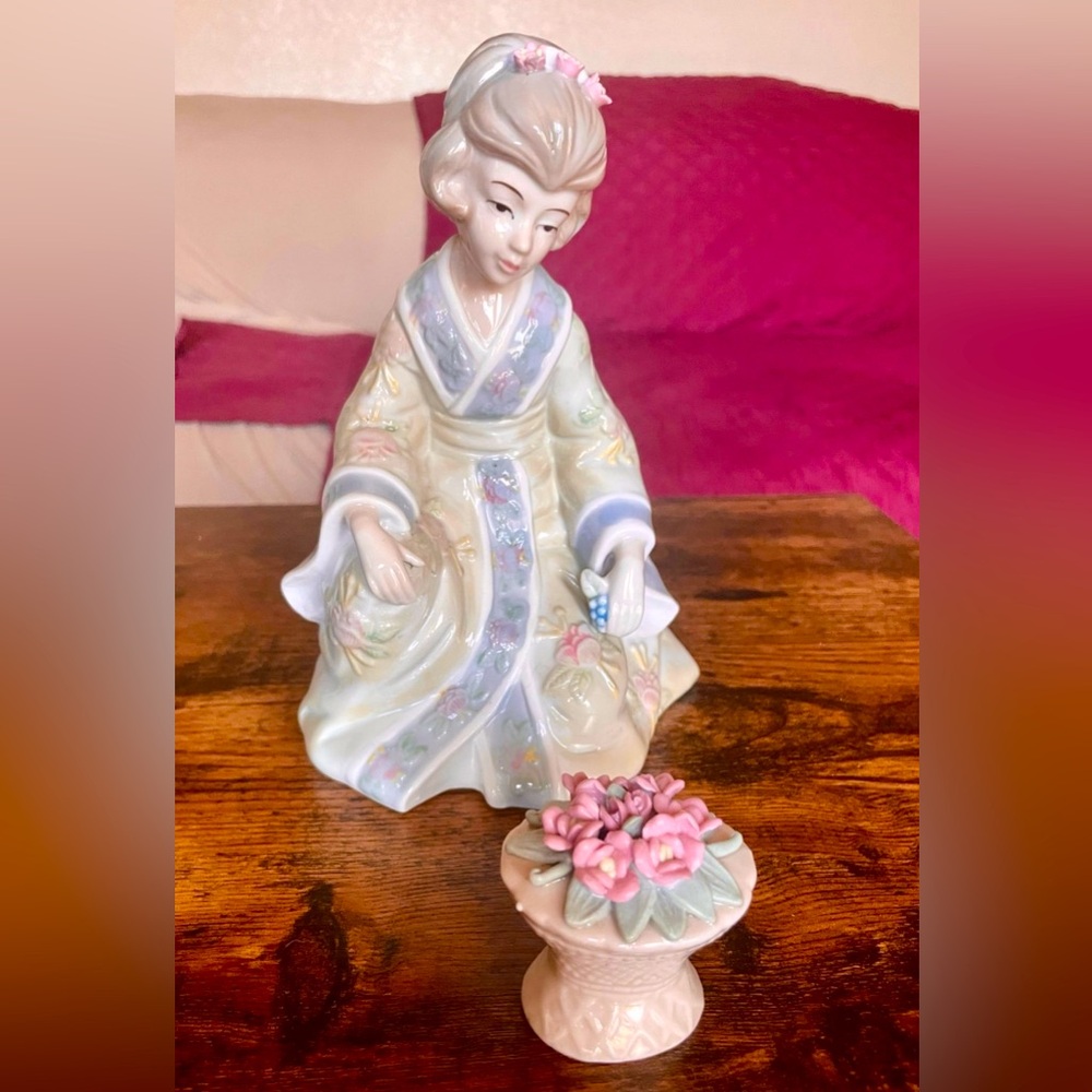 Geisha with flowers porcelain figurine, antique collectible
